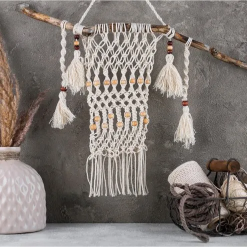 Knitted white wall hanging
