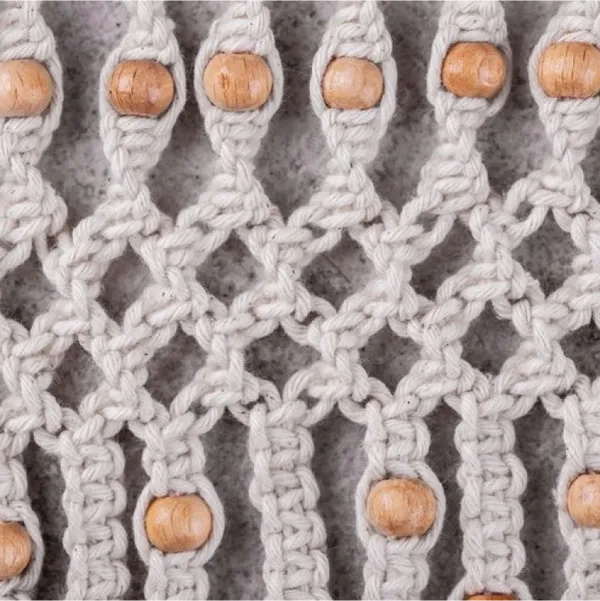Knitted white wall hanging