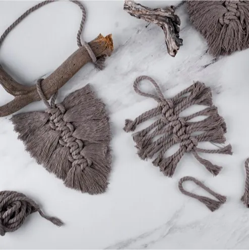 Hand knitted brown wall hanging