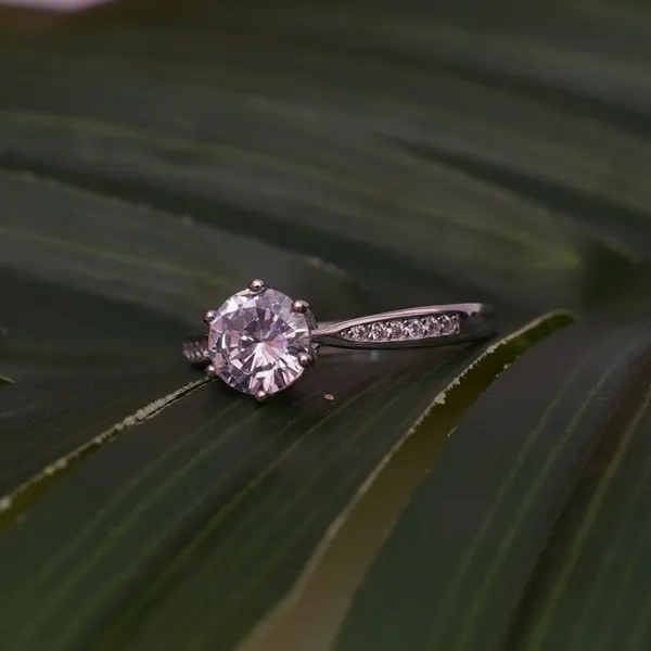 Solitaire side micro Ladies Ring